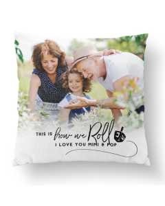 Square soft fabric pillow with a printed photo of grandparents and child, featuring custom text and dreidel graphic on white background.