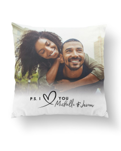 White personalized love pillow featuring a smiling couple’s photo with custom names Michelle & Javon and a handwritten heart design.