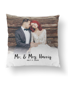 Square wedding anniversary pillow featuring a romantic couple in formal attire with personalized text Mr. & Mrs. Harris July 11, 2020.
